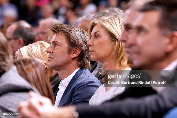 Politician Francois Baroin and actress Michele Laroque attend the final of the BNP Paribas Tennis Masters - day seven, at Palais Omnisports de Bercy...