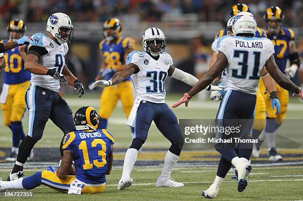 Jason McCourty of the Tennessee Titans celebrates after breaking up a pass intended for Chris Givens of the St. Louis Rams in the second quarter at...