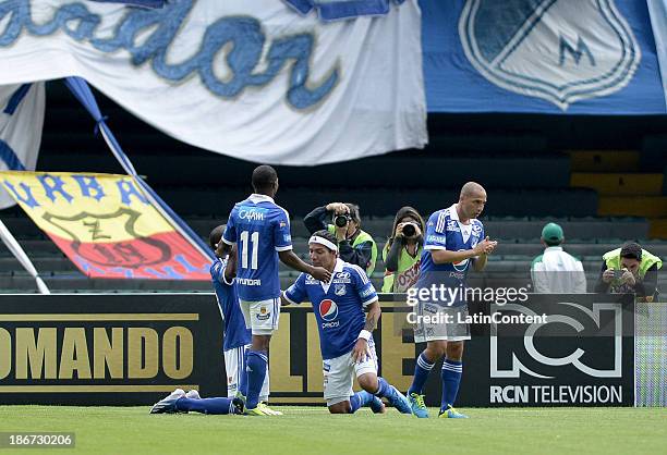 Dayro Moreno of Millonarios and his teammates celebrate a scored goal against Deportes Tolima during a match between Millonarios and Deportes...