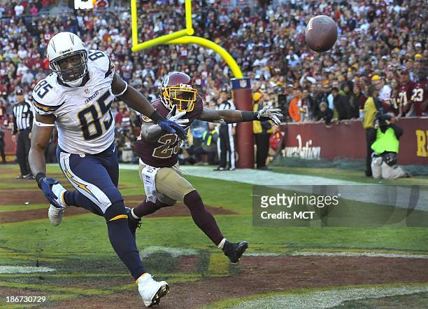 San Diego Chargers tight end Antonio Gates watchs as a pass from quarterback Philip Rivers go past him and Washington Redskins cornerback DeAngelo...