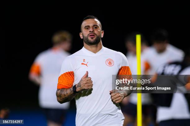 Kyle Walker of Manchester City warming up during Manchester City Training Session at King Abdullah Sports City on December 18, 2023 in Jeddah, Saudi...