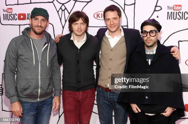 Dan Konopka, Andy Ross, Tim Nordwind and Damian Kulash of OK GO attends the YouTube Music Awards 2013 on November 3, 2013 in New York City.