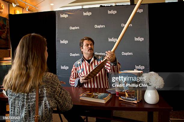 Actor Nick Offerman signs copies of his new book "Paddle Your Own Canoe" for his fans at Chapters Book Store on Robson and Howe on November 3, 2013...