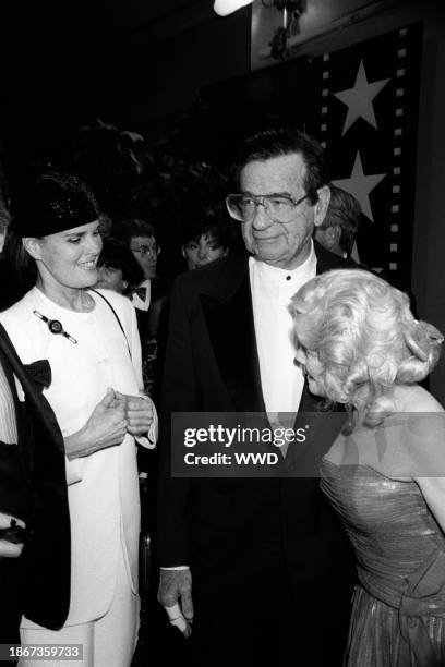 Outtake; Also ran in W 5/1/1994 p.42; Walter and Carol Matthau with Ali MacGraw at the American Film Institute awards ceremony on March 4, 1994 in...