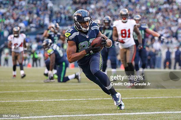 Wide receiver Doug Baldwin of the Seattle Seahawks scores a touchdown to tie the game at 24-24 in the fourth quarter against the Tampa Bay Buccaneers...