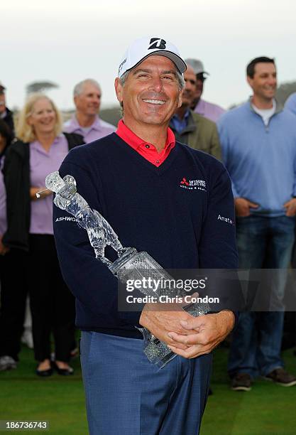 Fred Couples poses with the tournament trophy after winning the Charles Schwab Cup Championship at TPC Harding Park on November 3, 2013 in San...
