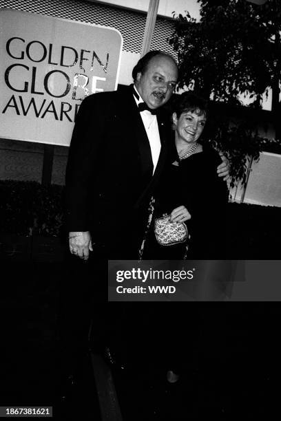 Outtake; Also ran W 3/1996 p.78; Dennis Franz and Joanie Zeck attend the Golden Globe awards on January 22, 1996 in Hollywood, California...Article...