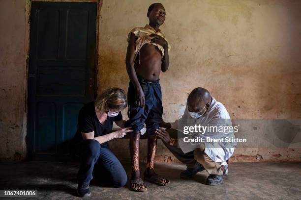 Stirton/Getty Images.) SALABONGO VILLAGE, WANIE RUKULA DISTRICT, DEMOCRATIC REPUBLIC OF CONGO: Drugs for Neglected Disease biologist Dr Sabine Specht...