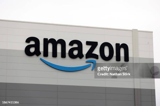 An Amazon logo is displayed outside the Amazon's Robotic Fulfillment Centre on December 19, 2023 in Sutton Coldfield, England. Launched in October,...