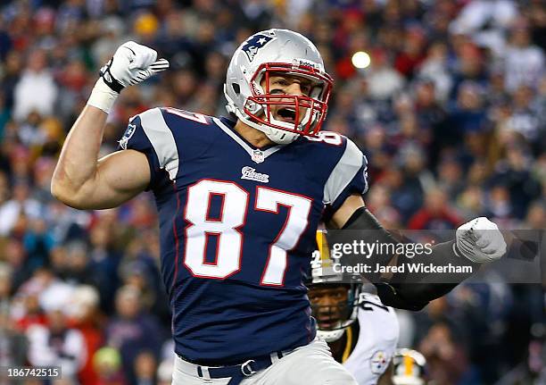 Rob Gronkowski of the New England Patriots reacts after a teammate missed a touchdown pass against the Pittsburgh Steelers in the first quarter at...
