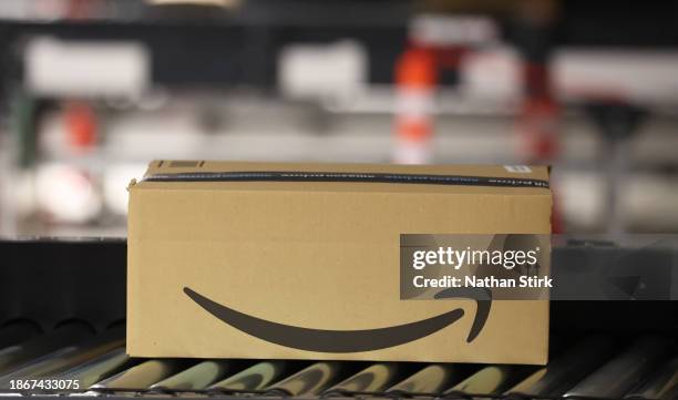 Amazon parcels are prepared for delivery at Amazon's Robotic Fulfillment Centre on December 19, 2023 in Sutton Coldfield, England. Launched in...