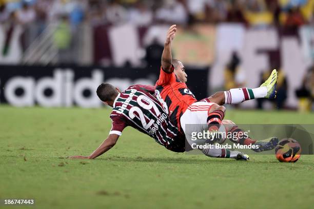 Bruninho of Flamengo struggles for the ball with a Biro Biro of Fluminense during a match between Flamengo and Fluminense as part of Brazilian Serie...