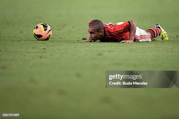 Bruninho of Flamengo struggles for the ball during a match between Flamengo and Fluminense as part of Brazilian Serie A 2013 at Maracana Stadium on...