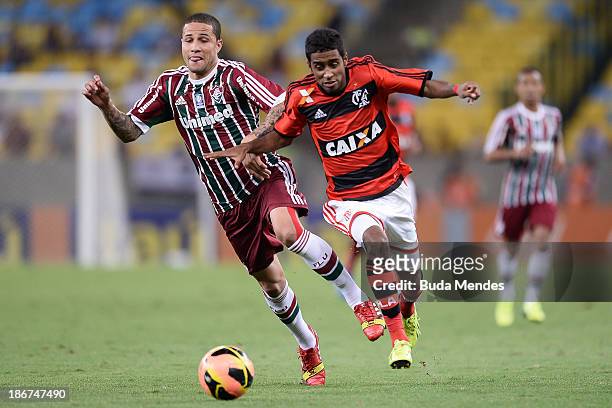 Gabriel of Flamengo struggles for the ball with a Bruno of Fluminense during a match between Flamengo and Fluminense as part of Brazilian Serie A...