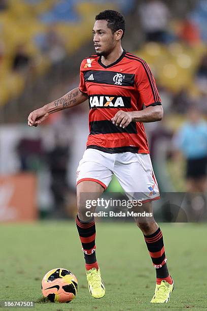 Hernane of Flamengo struggles for the ball during a match between Flamengo and Fluminense as part of Brazilian Serie A 2013 at Maracana Stadium on...