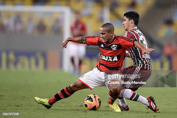 Bruninho of Flamengo struggles for the ball with a Igor of Fluminense during a match between Flamengo and Fluminense as part of Brazilian Serie A...