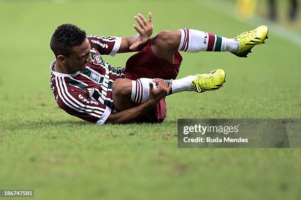 Biro Biro of Fluminense reacts during a match between Flamengo and Fluminense as part of Brazilian Serie A 2013 at Maracana Stadium on November 03,...