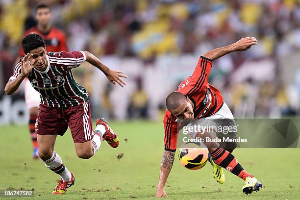 Bruninho of Flamengo struggles for the ball with a Igor of Fluminense during a match between Flamengo and Fluminense as part of Brazilian Serie A...