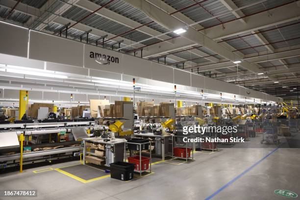 General view inside the Amazon's Robotic Fulfillment Centre on December 19, 2023 in Sutton Coldfield, England. Launched in October, the 24/7...
