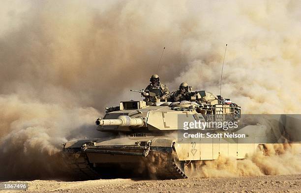 Army 3rd Infantry Division M1/A1 Abrahms tank rolls deeper into Iraqi territory March 23, 2003 south of the city of An Najaf, Iraq. U.S. And British...