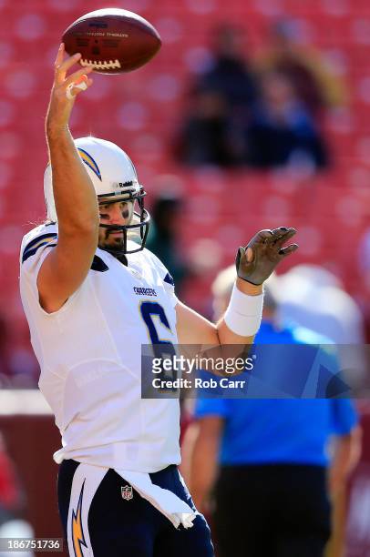 Quarterback Charlie Whitehurst of the San Diego Chargers throws a pass during warmups before the start of the Chargers and Washington Redskins game...