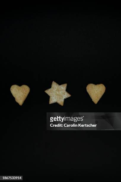 cookies in heart and star shape - biscuit tin stock pictures, royalty-free photos & images