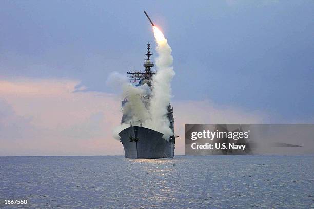 Tomahawk Land Attack Missile is launched on Iraq from the guided missile cruiser USS Cape St. George March 23, 2003 in the eastern Mediterranean Sea....