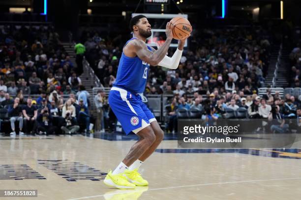 Paul George of the Los Angeles Clippers attempts a shot in the third quarter against the Indiana Pacers at Gainbridge Fieldhouse on December 18, 2023...