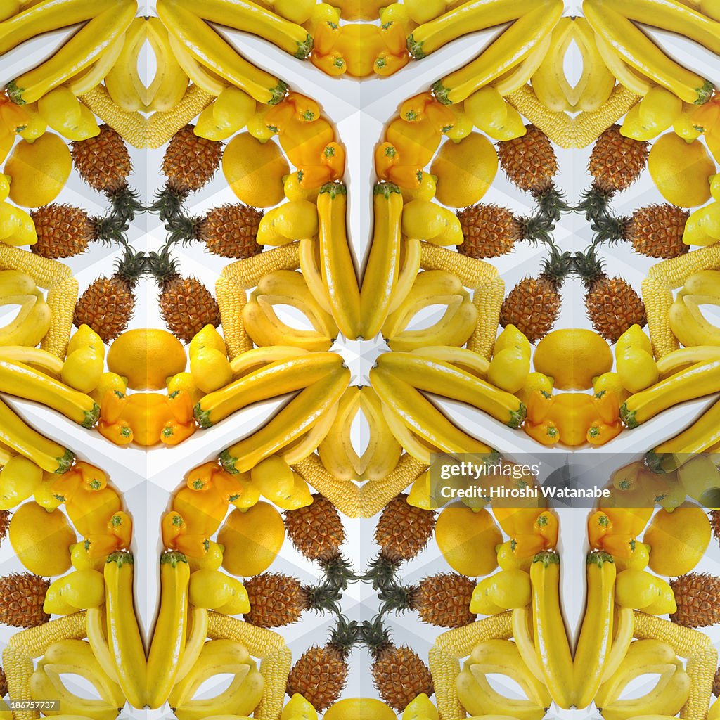 Kaleidoscope of yellow vegetables and fruits