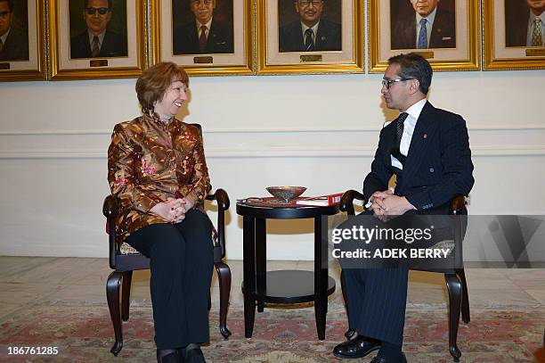 High Representative of the European Union for Foreign Affairs and Security Policy Catherine Ashton talks to Indonesia's Foreign Minister Marty...