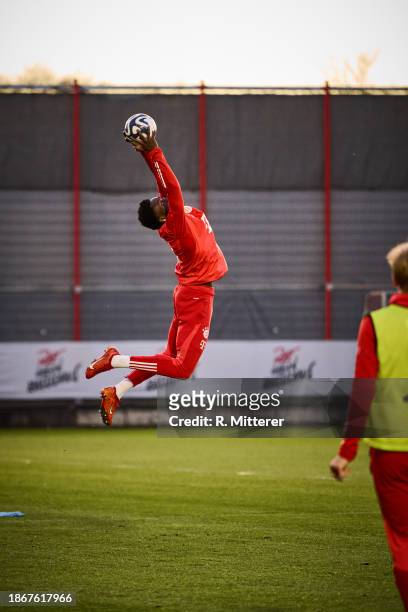 Alphonso Davies of FC Bayern Muenchen plays some WarmUp games during a training session at Saebener Strasse on December 19, 2023 in Munich, Germany.