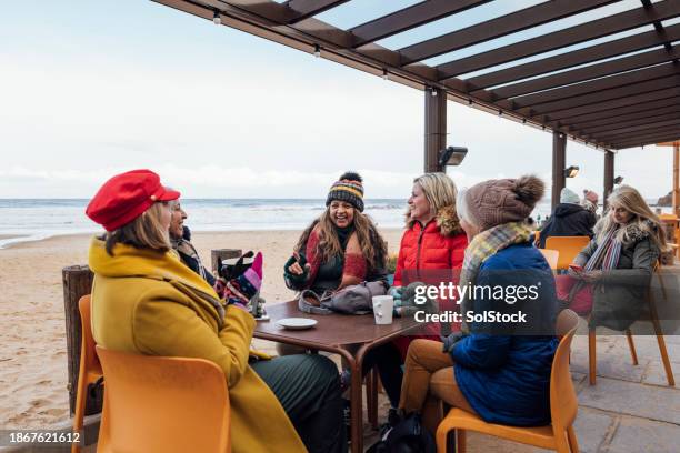 a coffee by the coast - tynemouth stock pictures, royalty-free photos & images
