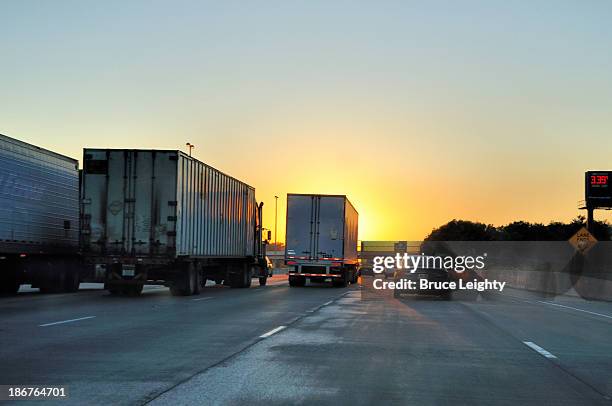 trucking into sunset - indiana v michigan stock pictures, royalty-free photos & images