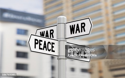 Street signs showing war and peace Street signs showing war and peace
