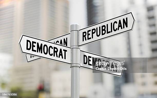 street signs with republican and democrat options - political party stock pictures, royalty-free photos & images