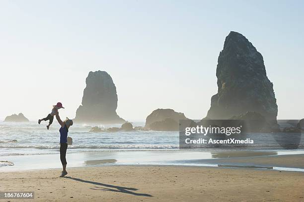 family time - oregon coast stock pictures, royalty-free photos & images