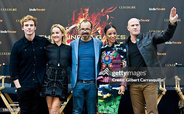 Actors Sam Claflin, Jena Malone, Jeffrey Wright, Meta Golding and Bruno Gunn attend the "The Hunger Games: Catching Fire" Victory mall tour at Cherry...