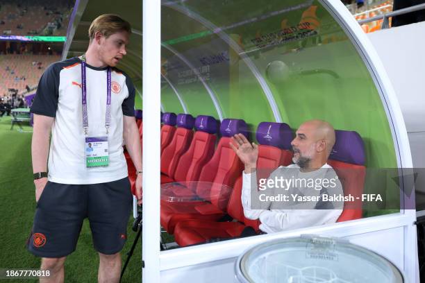 Kevin De Bruyne of Manchester City and Pep Guardiola, Manager of Manchester City interact prior to the FIFA Club World Cup Saudi Arabia 2023...