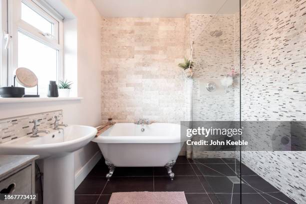 property interiors - free standing bath stock pictures, royalty-free photos & images