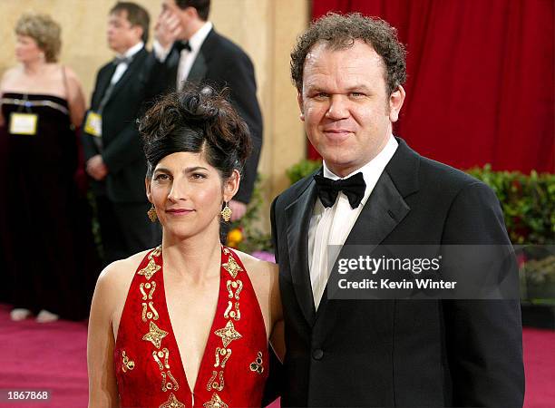 Actor John C. Reilly and wife Alison attend the 75th Annual Academy Awards at the Kodak Theater on March 23, 2003 in Hollywood, California.