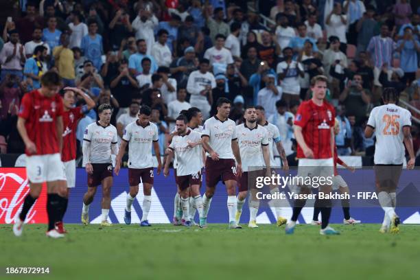 Players of Manchester City celebrate after Marius Hoibraten of Urawa Red scores their sides own goal during the FIFA Club World Cup Saudi Arabia 2023...