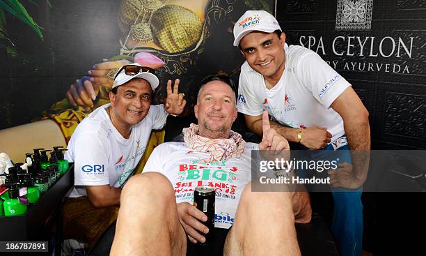 In this handout image provided by Laureus, Sir Ian Botham poses with Sourav Ganguly and Sunil Gavaskar before the fourth day of Beefy's Big Sri Lanka...