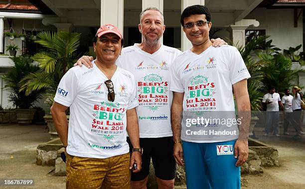 In this handout image provided by Laureus, Sir Ian Botham with Sourav Ganguly and Sunil Gavaskar before the fourth day of Beefy's Big Sri Lanka walk...