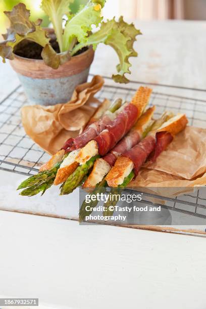 asparagus, pancetta, egg and bread snack - pancetta stock pictures, royalty-free photos & images