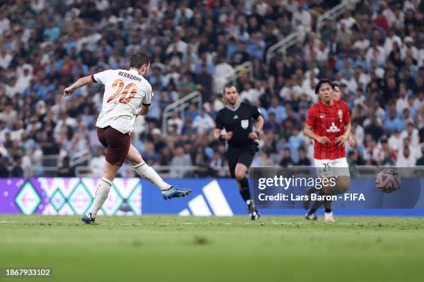 Bernardo Silva of Manchester City scores their sides third goal during the FIFA Club World Cup Saudi Arabia 2023 Semi-Final match between Urawa Reds...