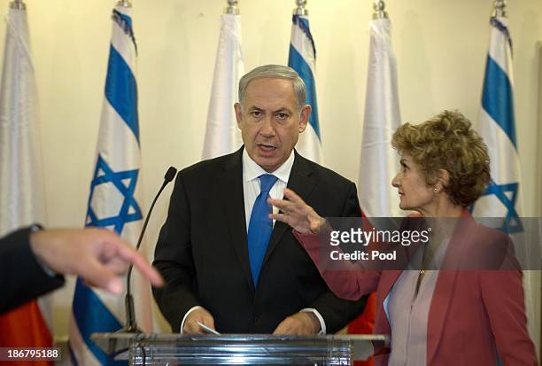 Israeli Prime Minister Benjamin Netanyahu prepares before welcoming Polish President Bronislaw Komorowski before a press conference before their...