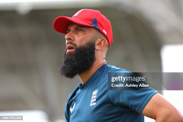Moeen Ali of England looks on ahead of play during the 4th T20 International match between West Indies and England at Brian Lara Cricket Academy on...