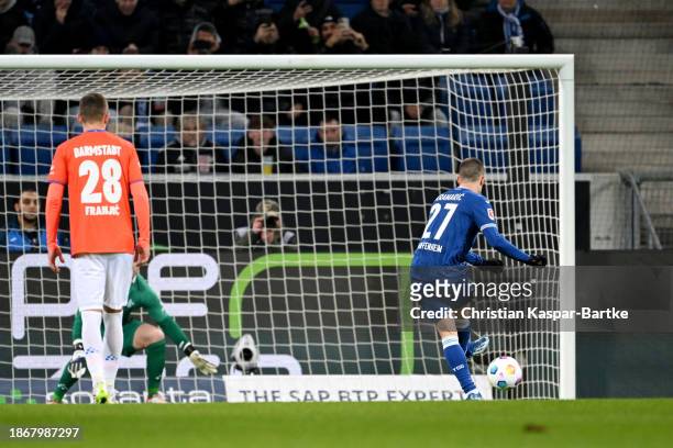 Andrej Kramaric of TSG 1899 Hoffenheim scores their team's first goal from the penalty spot during the Bundesliga match between TSG Hoffenheim and SV...