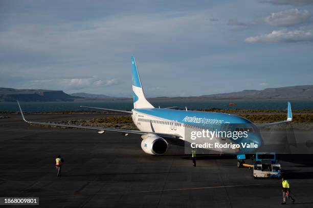 Boeing 737 aircraft of Aerolineas Argentinas taxies on the runway of the International Airport Comandante Armando Tola on December 15, 2023 in El...