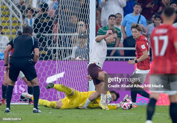 Shusaku Nishikawa of Urawa Reds attempting to take the ball from Jack Grealish of Manchester City's feet during the FIFA Club World Cup match between...